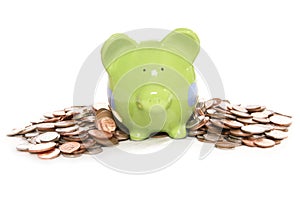 Piggy bank moneybox with British currency coins