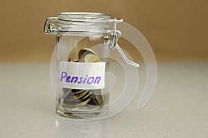 Piggy Bank, moneybox with coins, inscription Pension