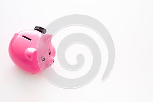 Piggy bank. Moneybox in shape of pig near hammer on white background copy space