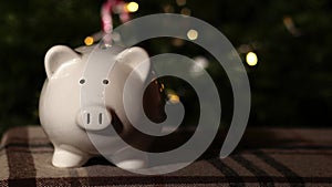Piggy bank savings in Christmas background