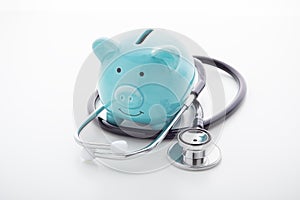 Piggy bank with stethoscope