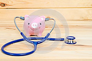 Piggy Bank and Stethoscope.