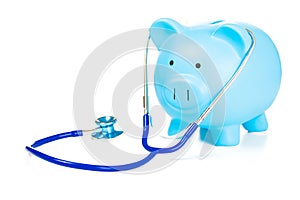 Piggy bank and Stethoscope Isolated on white background