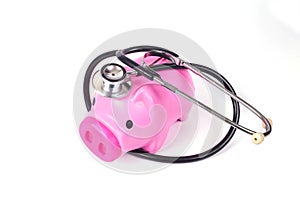 piggy bank with stethoscope in save health
