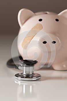 Piggy Bank and Stethoscope with Selective Focus