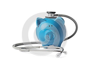 Piggy bank with stethoscope on white background. Medical insurance