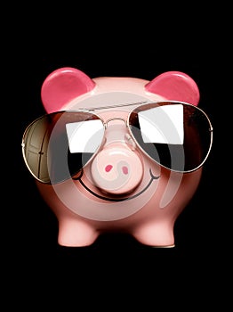 Piggy bank with sunglasses