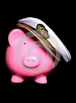 Piggy bank wearing sailors hat