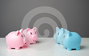 Piggy banks of different genders according to colors. photo