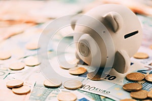 Piggy moneybox with euro cash photo