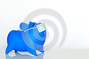 Piggy with wearing protective medical mask on white background, Save money for Medical insurance and Health care concept
