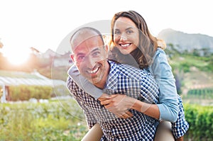 Piggyback mature couple