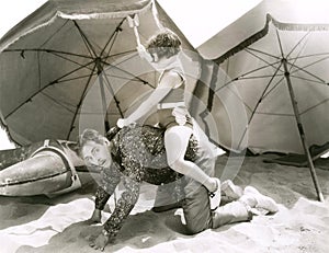 Piggyback ride on the beach