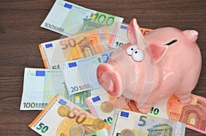 Piggybank with euro notes