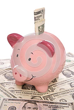 Piggybank with Us dollar money photo