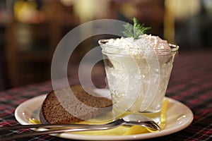 Pike caviar with black bread on a plate