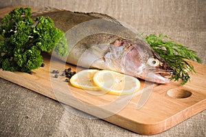 Pike perch on a kitchen board