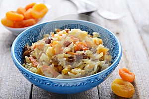 Pilaf with dried apricots and raisins