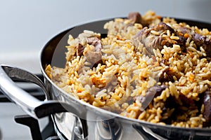 Pilaf (meat of a ram paella)