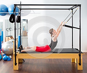 Pilates aerobic instructor woman in cadillac