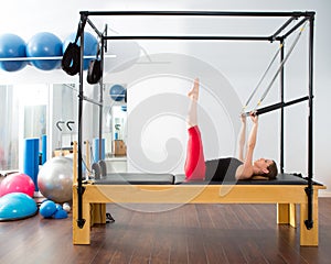 Pilates aerobic instructor woman in cadillac