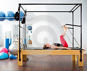 Pilates aerobic instructor woman in cadillac