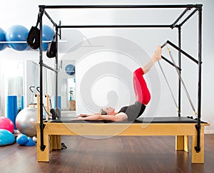 Pilates aerobic instructor woman in cadillac