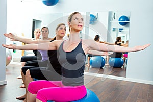 Pilates aerobic women group with stability ball