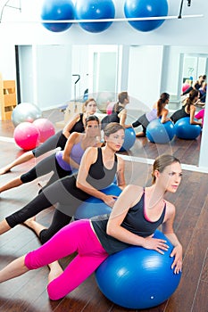 Pilates aerobic women group with stability ball