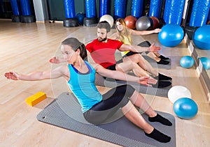 Pilates people group exercise man and women photo