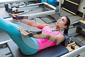 Pilates reformer workout exercises woman