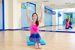 Pilates woman stretching exercise workout at gym