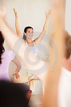 Pilates, yoga and people with personal trainer for class stretching, exercise and workout on mat. Fitness, health club