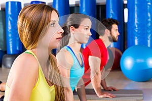 Pilates Yoga training exercise in fitness gym