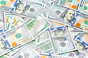 a pile of 100 dollar bills close up