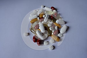 Pile of 5 different types of pills
