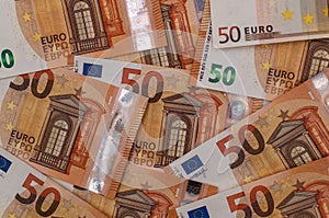 Pile of 50 euro banknotes close-up.