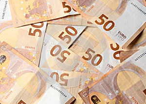 Pile of 50 euro notes business background