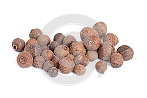 Pile Allspice isolated on white background. photo