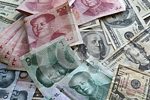 A pile of America and China currency