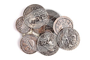 Pile of Ancient Roman Coin Replicas  Isolated on a White Background