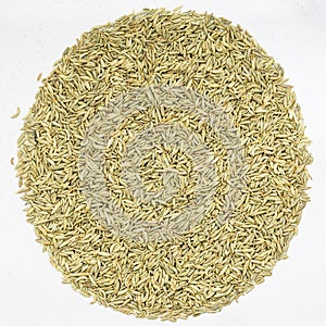 Pile of anise seeds on gray ceramic plate