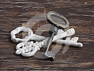 Pile of antique white and brass keys