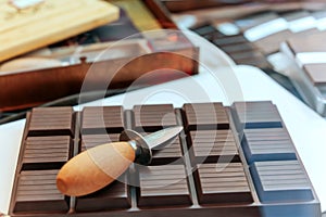 Pile of assorted chocolate bars close-up