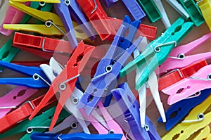 Pile of assorted clothes pegs