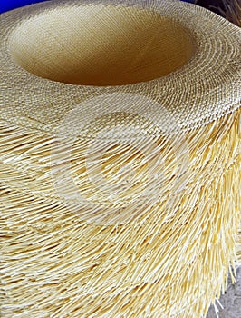 Pile of authentic Panama hats, Ecuador photo
