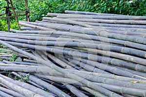 a pile of bamboo sticks with a vertical angel