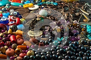 Pile of beads, buttons, black pearls and decorative accessories