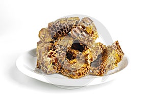 Pile of bee pollen or bee bread on the bright background