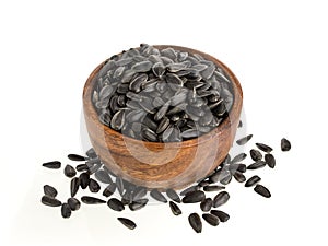 Pile of black sunflower seeds isolated on white background